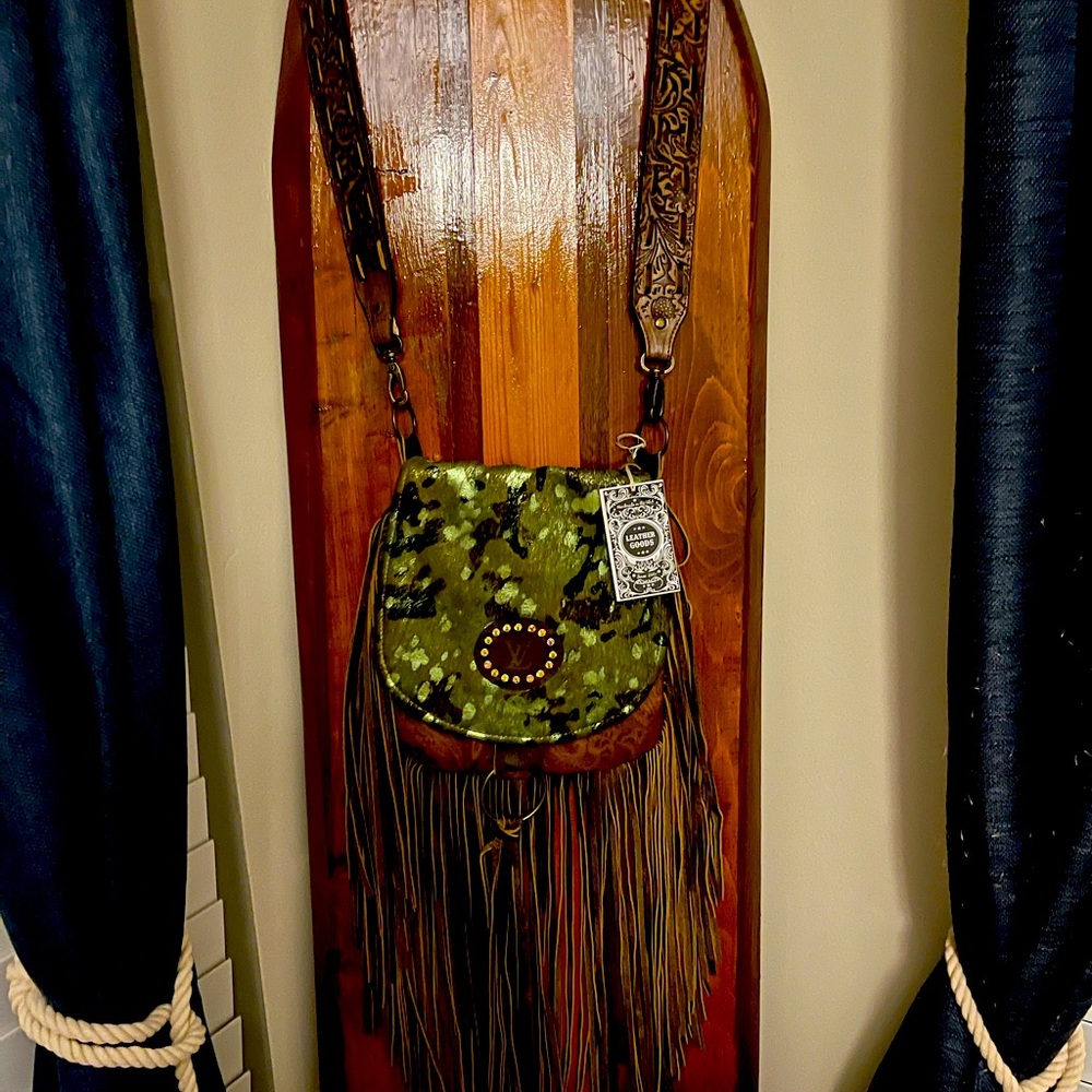 STUNNING upcycled Keep It Gypsy fringed bag with authentic Louis Vuitton tag.